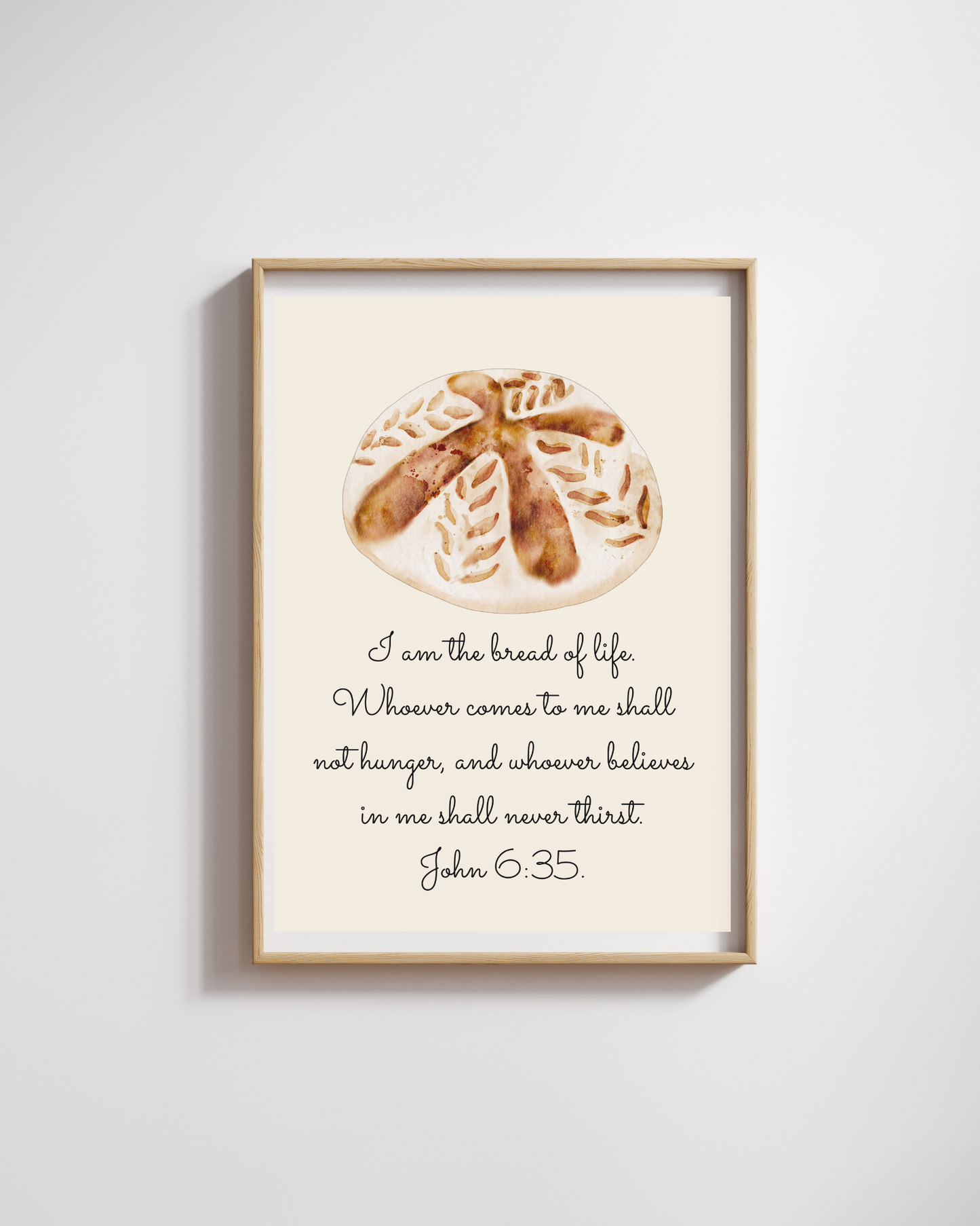 Christian wall art John 6:35 framed on kitchen wall, surrounded by plants and cozy home accents