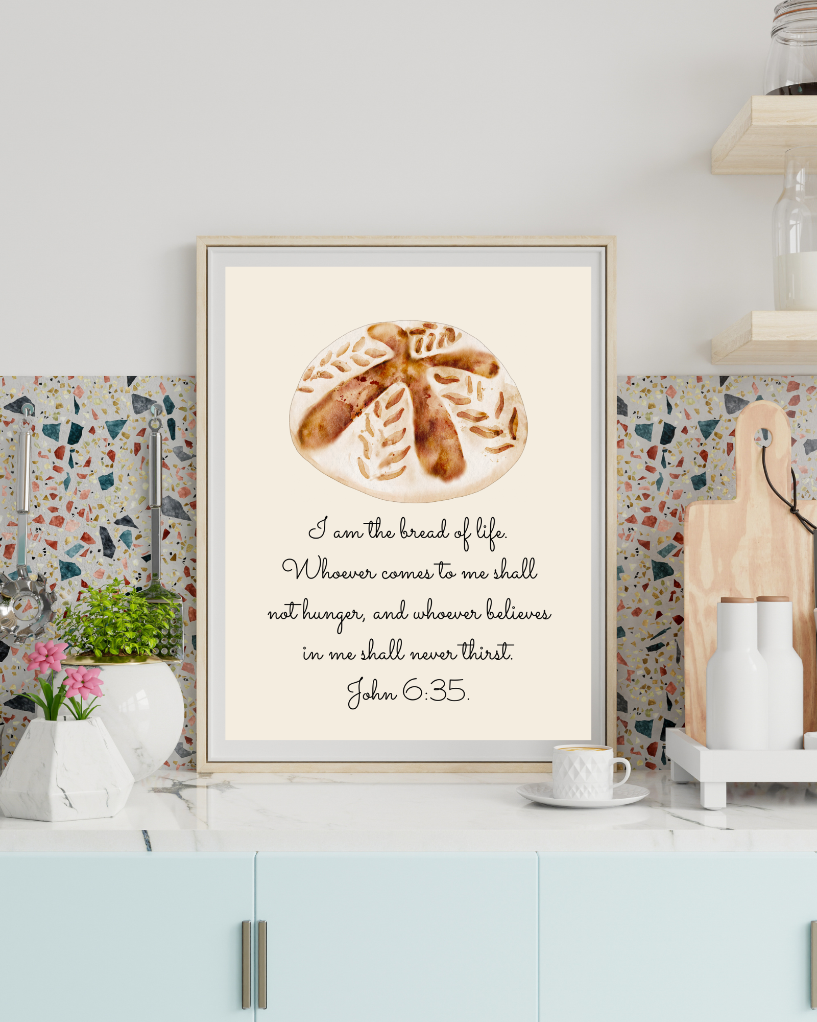 Minimalist John 6:35 wall art displayed above kitchen table, paired with linen cloth and neutral décor