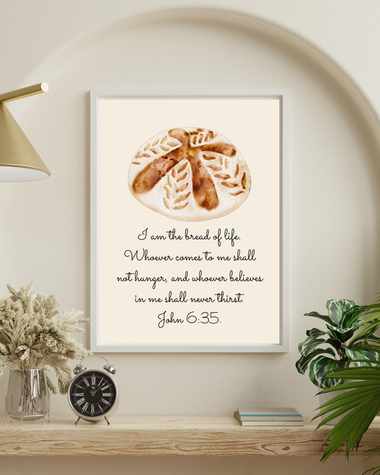 John 6:35 “Bread of Life” wall art framed in farmhouse kitchen with natural light and bread on counter